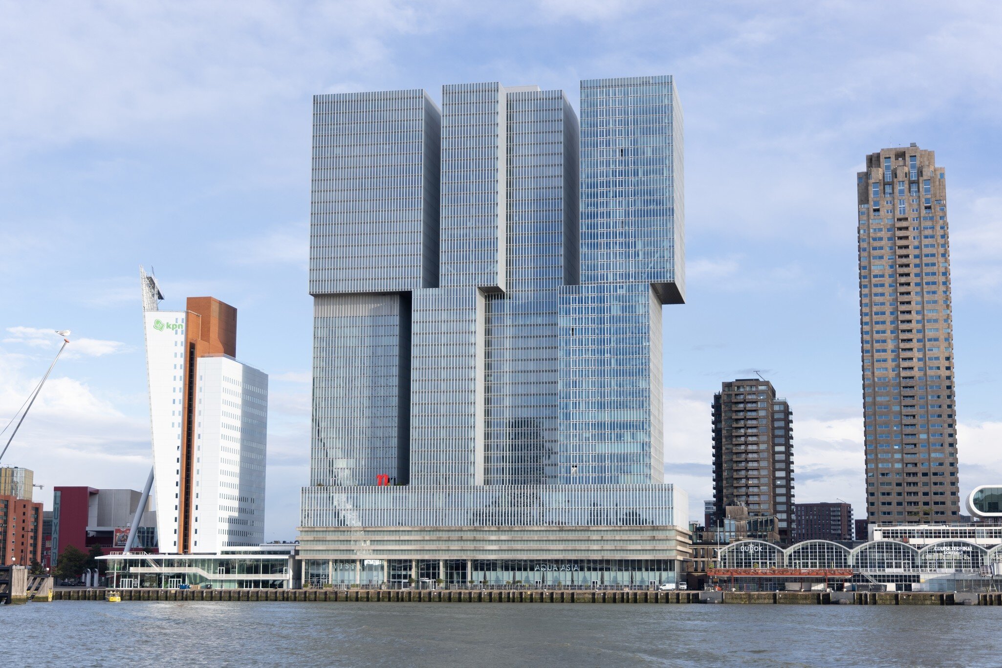 View of De Rotterdam Building by the water in Rotterdam.