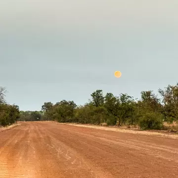 Mornington
Full moon setting over Fairfield Leopold Downs Road at the Gibb River Road junction, , West Kimberley