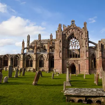 The ruins of Melrose Abbey on a bright sunny day, Melrose, Scotland, United Kingdom