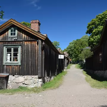 Turku, Finland - July, 2020: Beautiful old homes and artisan quarters in Luostarinmaki open air museum. This is the only wooden neighbourhood that survived the Great Fire of Turku in 1827.; Shutterstock ID 1784353256;