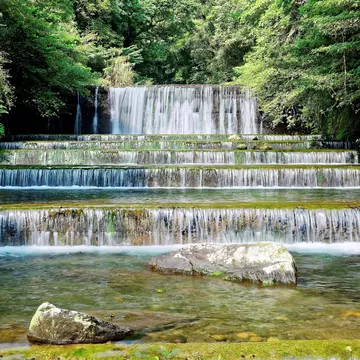 Series of small waterfalls in the Forest Recreation Area of Wulai during spring.