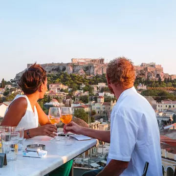 Enjoy outdoor dining while gazing at the Parthenon in Athens. Matteo Colombo/Getty Images