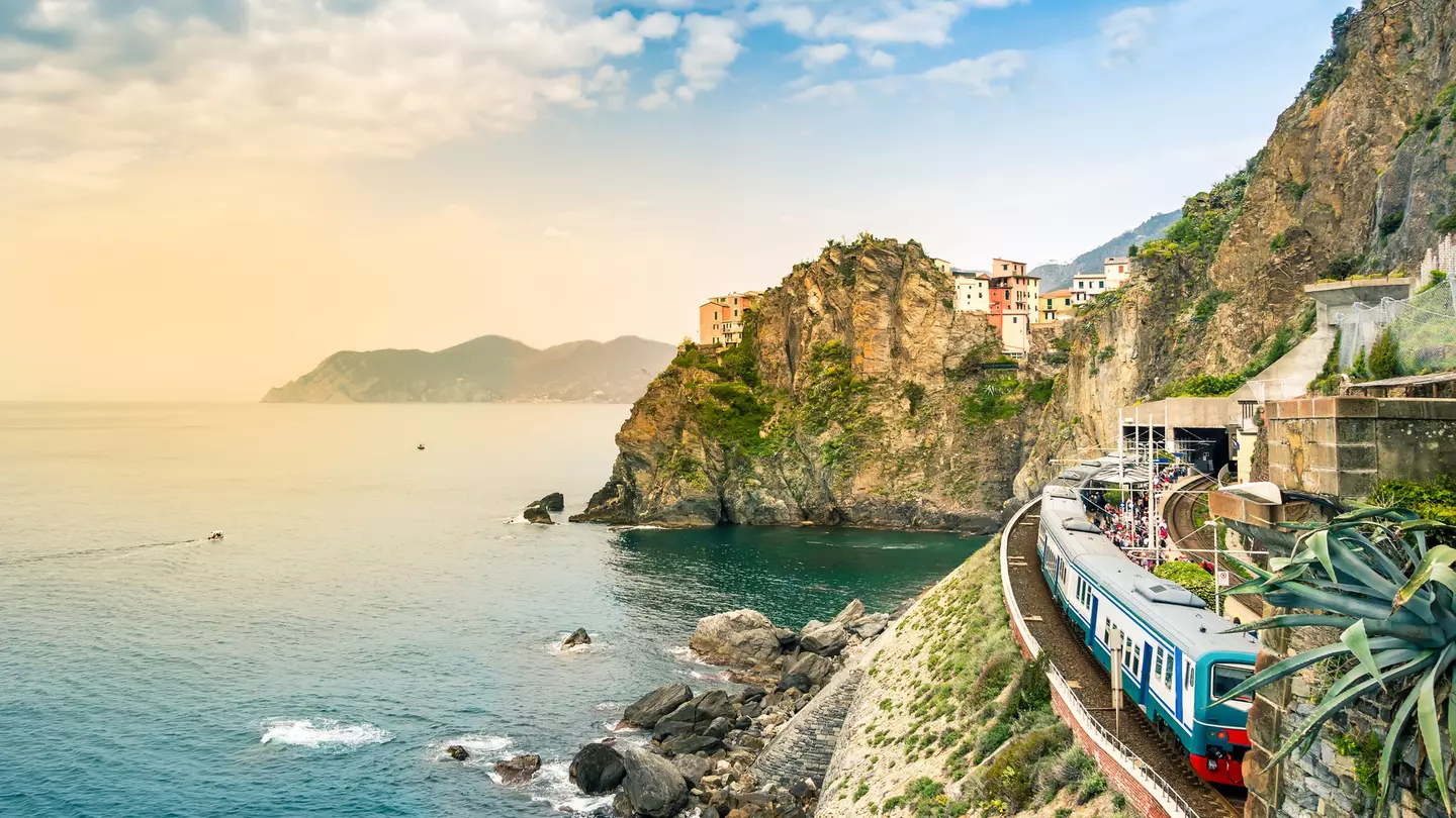 Cinque Terre National Park a famous tourist destination that's accessible by train in Liguria  © Julia Lavrinenko / Getty Images
