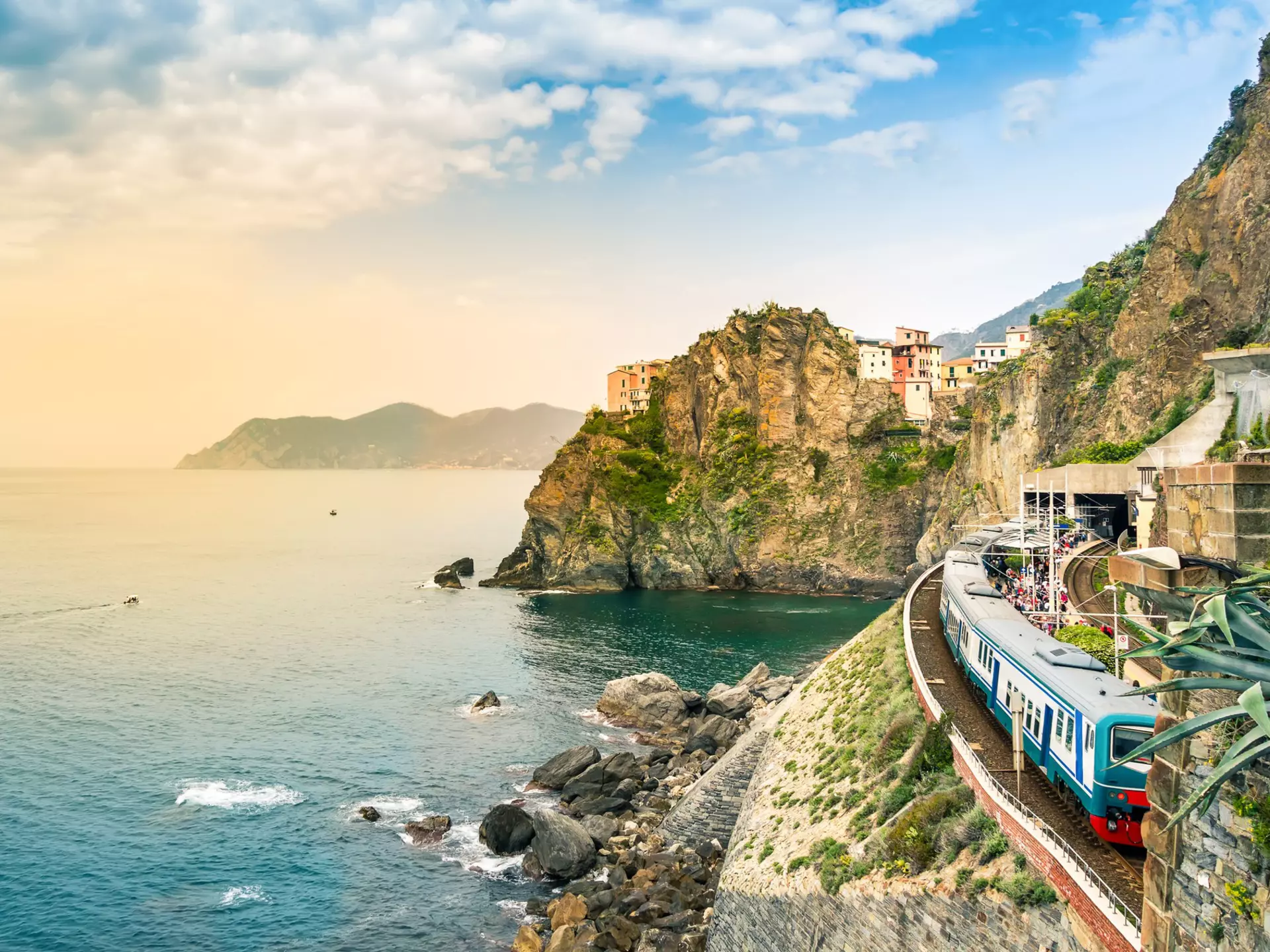 Cinque Terre National Park a famous tourist destination that's accessible by train in Liguria  © Julia Lavrinenko / Getty Images