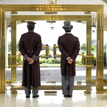 Concierge and bellboy standing at a hotel entrance and looking out the door.
200537468-001
Day, Door, Mid Adult, Males, Service, Mature Adult, 40-44 Years, Standing, Entrance, Flooring, Only Men, Waiting, Rear View, Hotel, Indoors, Concierge, Horizontal, Mature Men, Tile, Reflection, Two People, Preparation, 30-34 Years, Transparent, Looking, 30-39 Years, Full Length, Color Image, Bellhop, Contemplation, Spain, Mid Adult Men, Responsibility, Uniform, Hotel Reception, Grass, Men, Photography, Adults Only