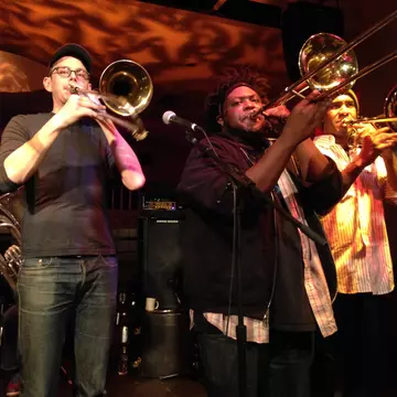Members of No BS Brass Band of Richmond, Virginia perform at Stuart's Opera House, Nelsonville, Ohio, USA in February 2015.  License Type: media  Download Time: 2021-08-19T12:59:25.000Z  User: AMccarthy_lonelyplanet  Is Editorial: Yes  purchase_order:   