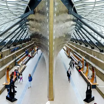 LONDON, UNITED KINGDOM - APRIL 10, 2017: Tourists at the exhibition underneath Cutty Sark's keel. Cutty Sark was preserved as a museum ship and become a popular tourist attraction in Greenwich.  License Type: media  Download Time: 2024-05-06T03:09:33.000Z  User: pinkjozie64  Is Editorial: Yes  purchase_order:   