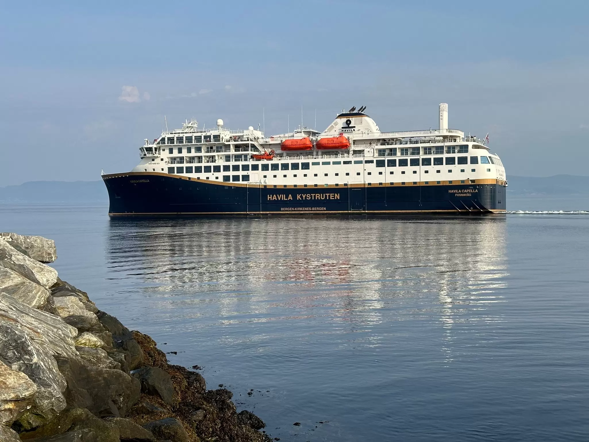 Experience Norway's incredible coastline from the comfort of a cruise ship. Melissa Yeager/Lonely Planet