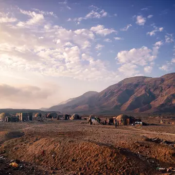 View of traditional houses against mountains