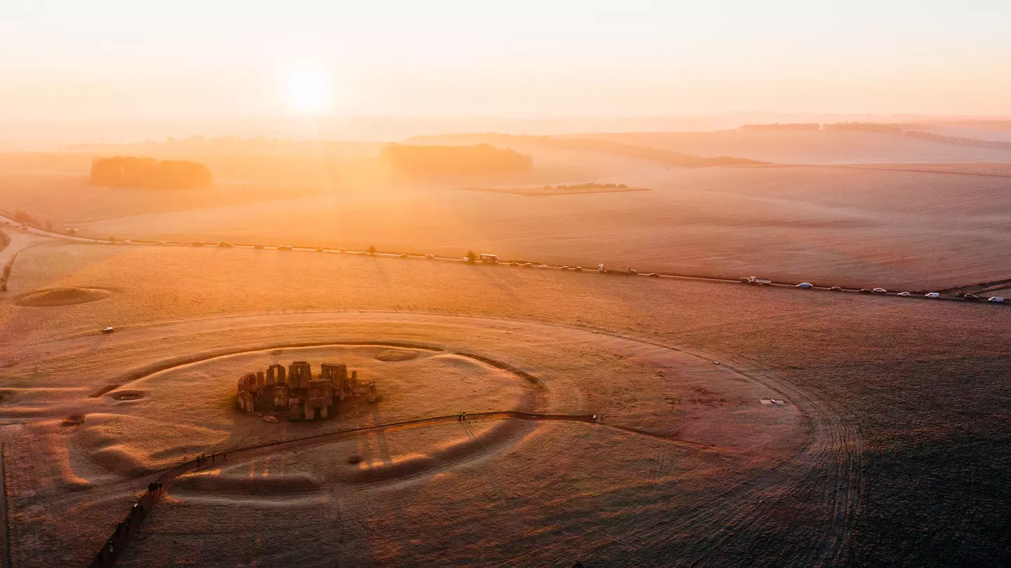 People gather at Stonehenge on the winter solstice to witness the sunrise after the longest night of the year. 	Karl Hendon/Getty Images
