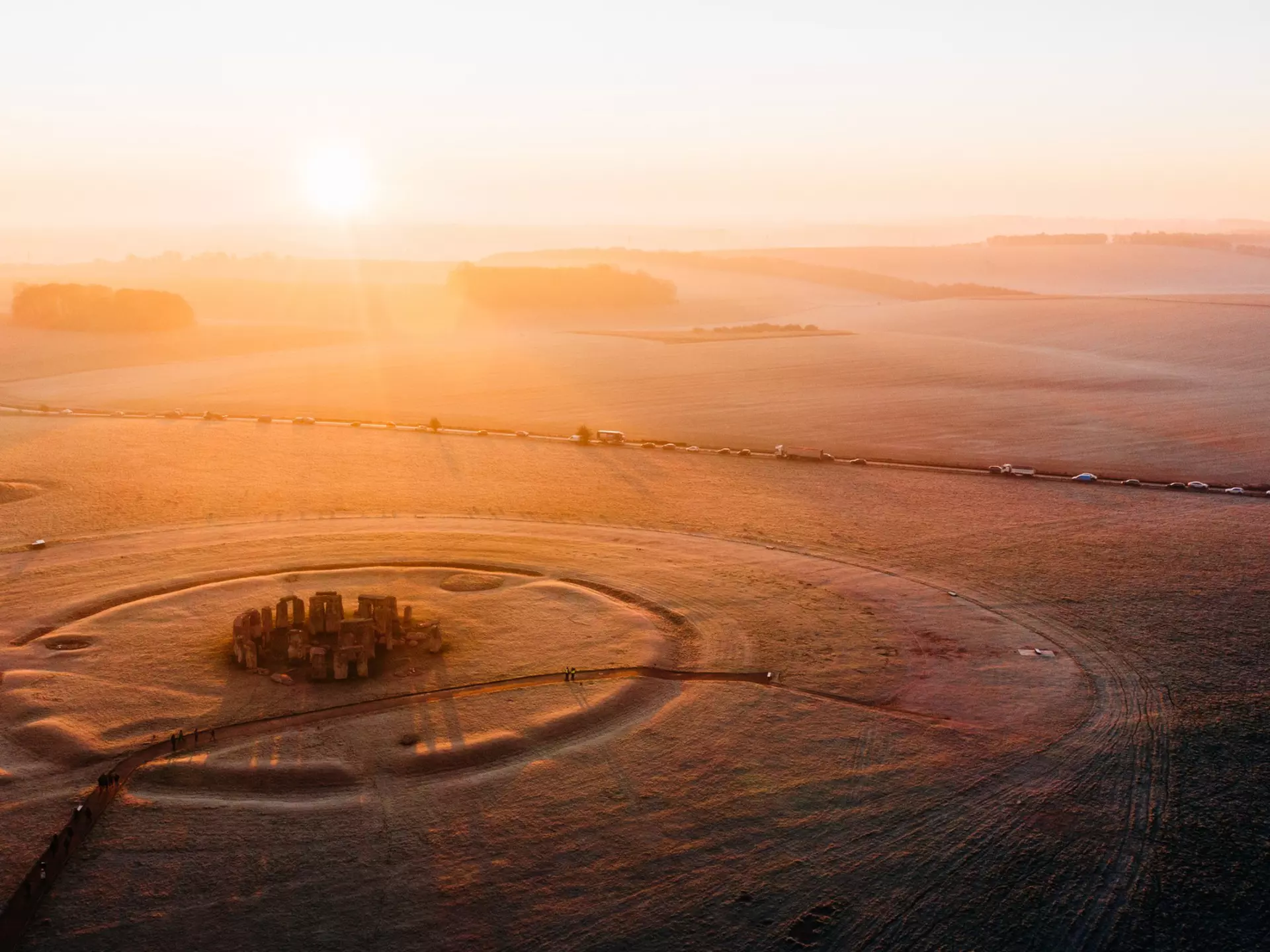 People gather at Stonehenge on the winter solstice to witness the sunrise after the longest night of the year. 	Karl Hendon/Getty Images
