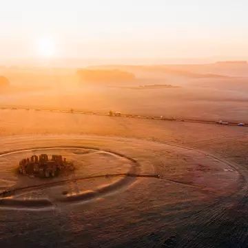 People gather at Stonehenge on the winter solstice to witness the sunrise after the longest night of the year. 	Karl Hendon/Getty Images
