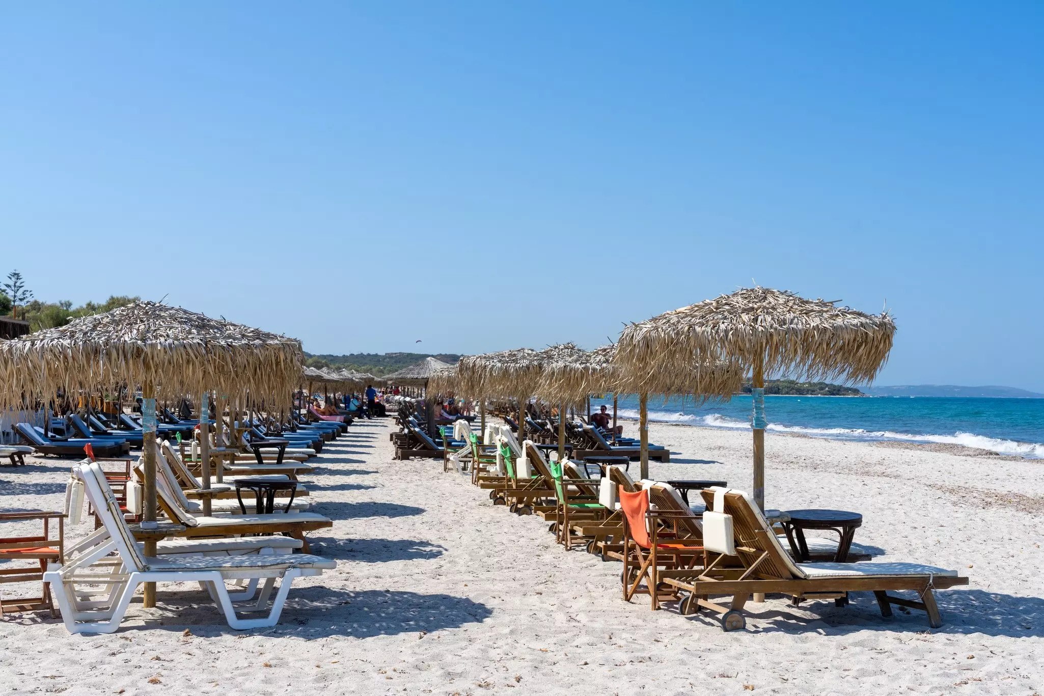 Kos Greece - August 25 2024; Rows of sun-loungers lined up for beach-goers on Mastihari Beach on Island of Kos., License Type: media, Download Time: 2025-05-06T11:07:28.000Z, User: sashabrady26, Editorial: true, purchase_order: 65050 - Digital Destinations and Articles, job: Lonely Planet, client: A first-time guide to Kos, other: Sasha Brady