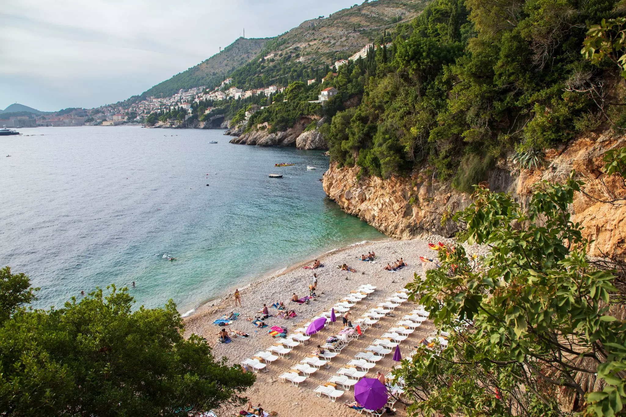 People enjoy the Sveti Jakov beach near Dubrovnik
