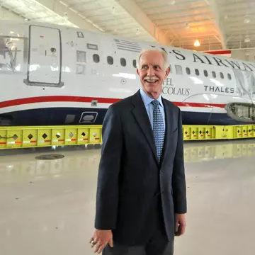 Capt. Chesley "Sully" Sullenberger in front of US Airways aircraft he landed in the Hudson River.