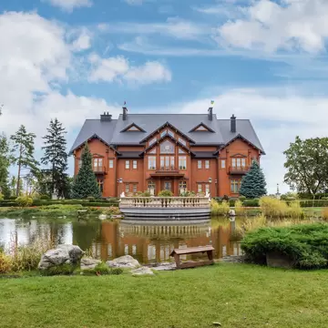 Mezhyhirya National Park, Novi Petrivtsi, Kyiv region, Ukraine - October, 16, 2020: Museum of Corruption. The large natural complex Mezhyhirya Residence with a beautiful garden, a cascade of lakes.