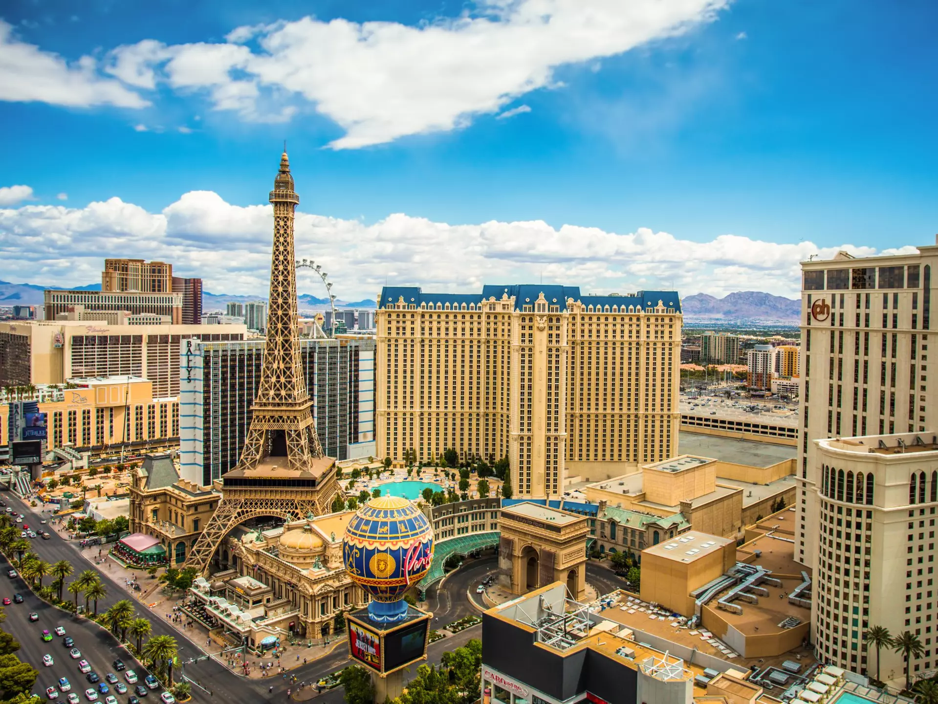 LAS VEGAS, NEVADA - MAY 7, 2014: Above ground view of Las Vegas Strip hotel resorts and casinos. Over 39.7 million people visit Las Vegas each year.
201350363
gamble, tower, destination, america, usa, fun, strip, travel, nevada, day, paris, landmark, attraction, bright, gambling, skyline, morning, sun, excitement, boulevard, entertainment, famous, architecture, city, colorful, buildings, desert, tourism, romantic, resort, hotel, casino, vacation, sin, united, vegas, states, las, planet, eiffel, hollywood