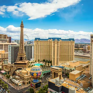 LAS VEGAS, NEVADA - MAY 7, 2014: Above ground view of Las Vegas Strip hotel resorts and casinos. Over 39.7 million people visit Las Vegas each year.
201350363
gamble, tower, destination, america, usa, fun, strip, travel, nevada, day, paris, landmark, attraction, bright, gambling, skyline, morning, sun, excitement, boulevard, entertainment, famous, architecture, city, colorful, buildings, desert, tourism, romantic, resort, hotel, casino, vacation, sin, united, vegas, states, las, planet, eiffel, hollywood