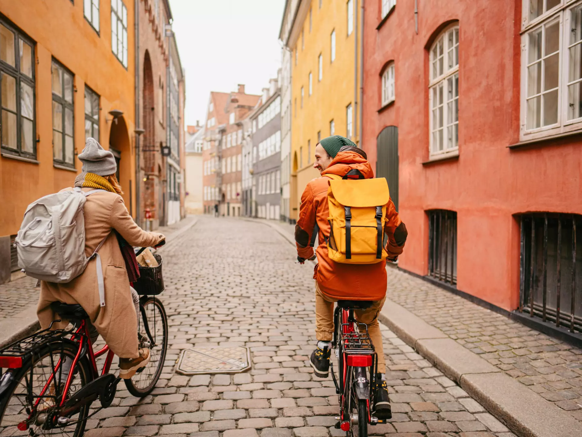 A couple cycle in Copenhagen