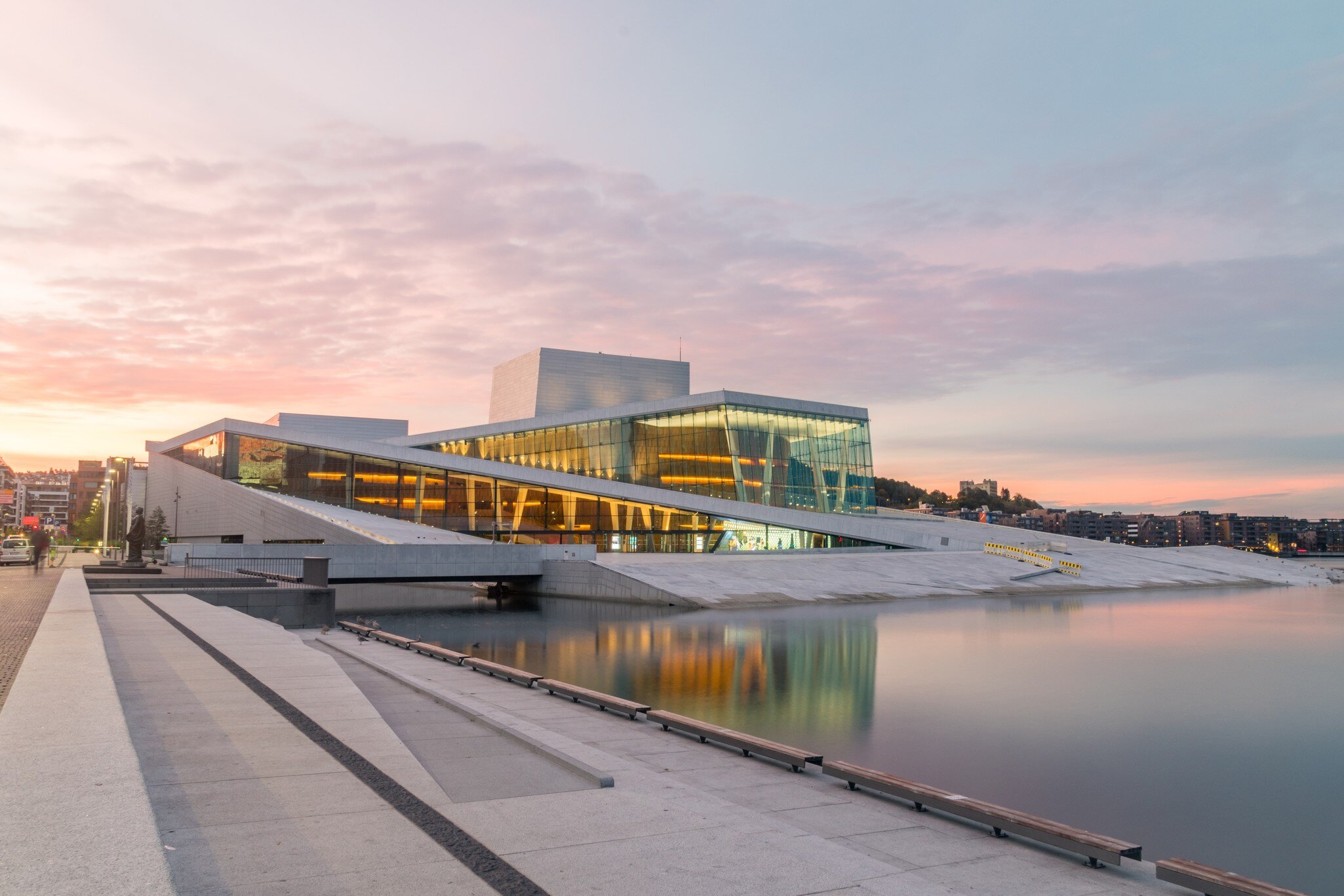 Oslo, Norway - September 24, 2021: Oslo Opera House (Operahuset) at sunrise. Building is situated at head of Oslofjord.  License Type: media  Download Time: 2024-02-12T21:26:43.000Z  User: mvm_lonelyplanet  Is Editorial: Yes  purchase_order:   