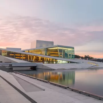 Oslo, Norway - September 24, 2021: Oslo Opera House (Operahuset) at sunrise. Building is situated at head of Oslofjord.  License Type: media  Download Time: 2024-02-12T21:26:43.000Z  User: mvm_lonelyplanet  Is Editorial: Yes  purchase_order:   