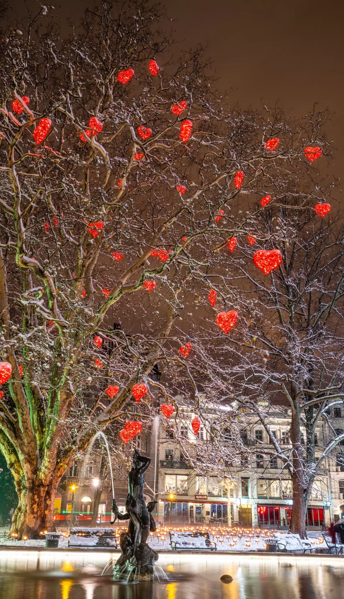 The tree of love filled with red hearts at Gusav Adolf's Square in Malmö during Christmas time.