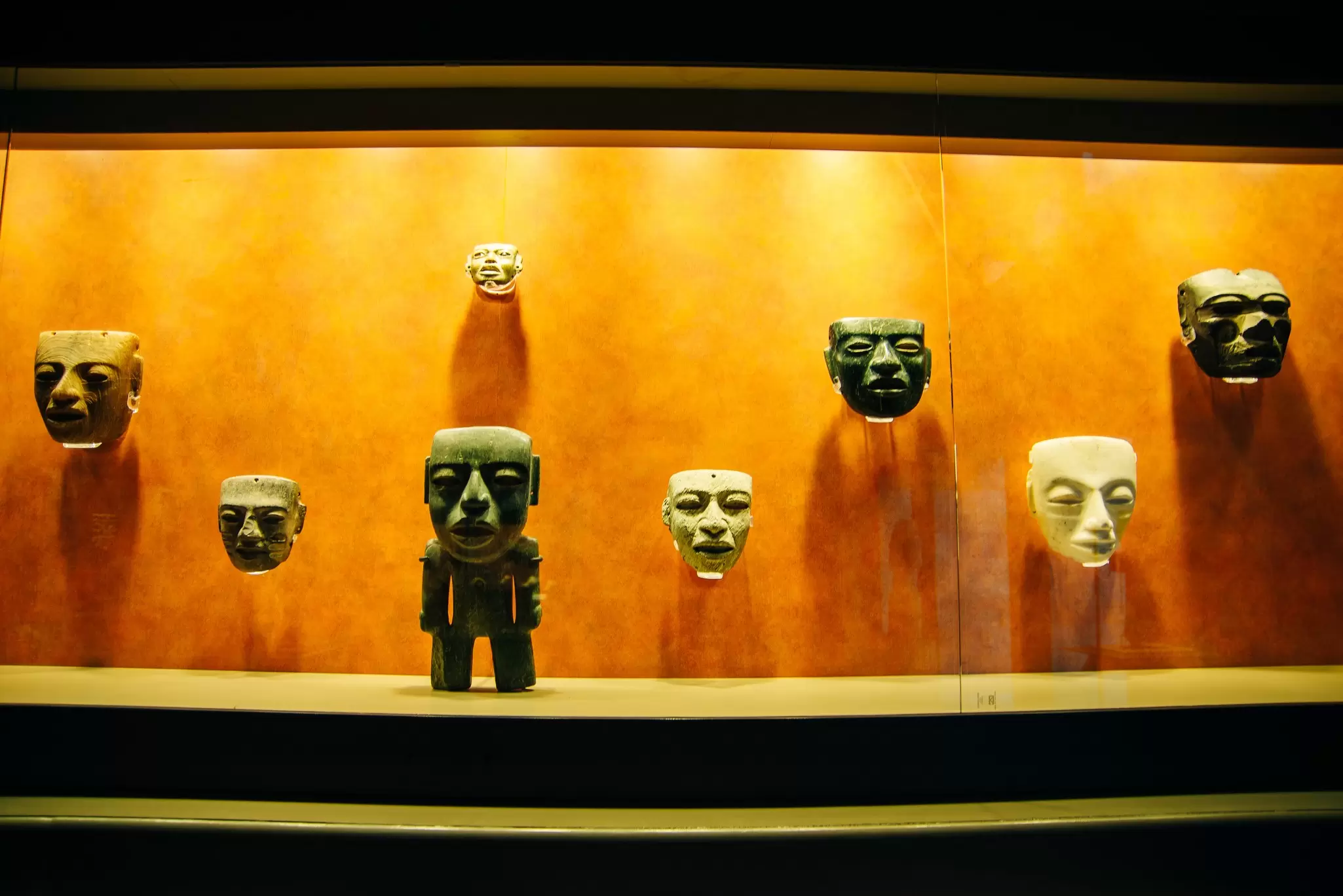 View of stone masks on display at the Museo Nacional de Antropología in Mexico City, Mexico.