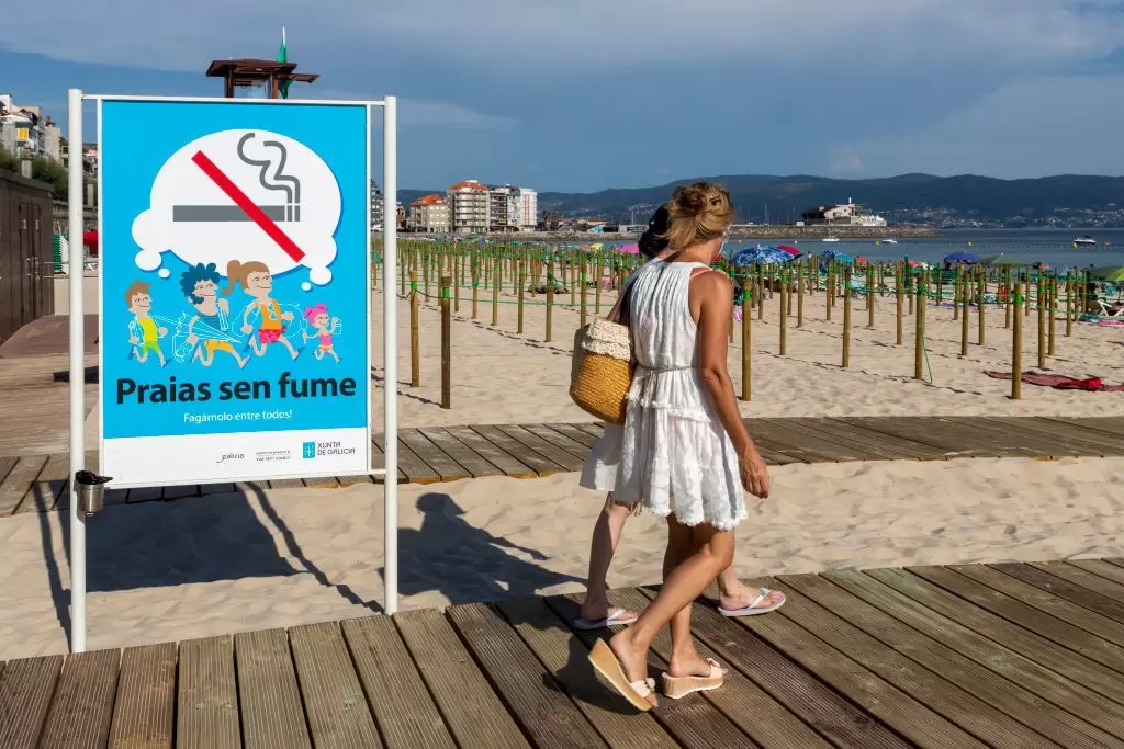 A no-smoking sign on a beach in Sanxenxo, Galicia, Spain