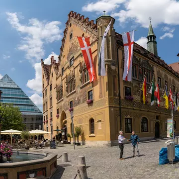Ulm, BW / Germany - 14 July 2020: view of the town square in historic Ulm with people enjoying a day out