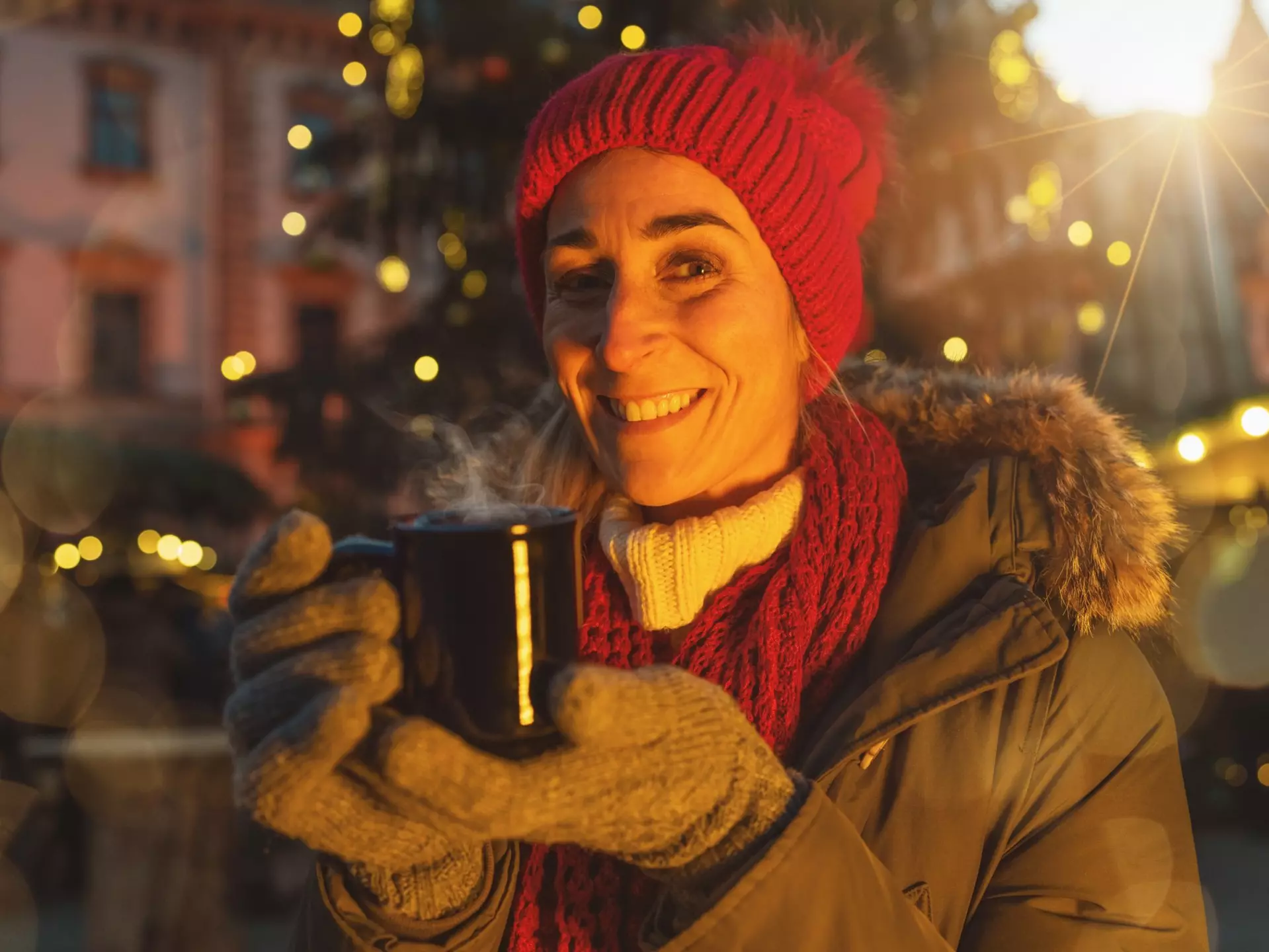Happy woman in front of Christmas tree on Christmas market drinking hot wine at winter, License Type: media, Download Time: 2025-11-14T02:08:08.000Z, User: katherineeloisemarsh73, Editorial: false, purchase_order: 56530 - Guidebooks, job: Global Publishing-WIP, client: Munich Bavaria & the Black Forest 9, other: Kat/Marsh