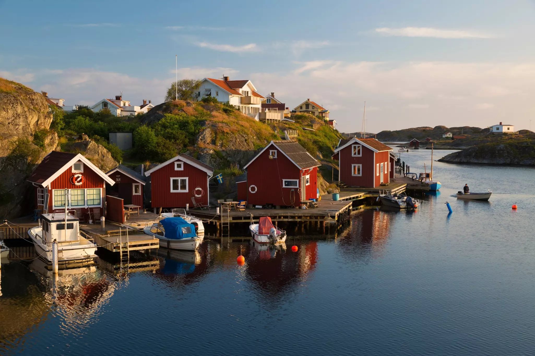 Red fishermen's huts by harbour and archipelago, Stocken, Orust, Bohuslan Coast, Southwest Sweden