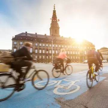 Further reduce your carbon footprint by cycling in bike-friendly Copenhagen. william87 / Getty Images