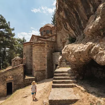 A child explores a church in the town of Mystras in Greece.