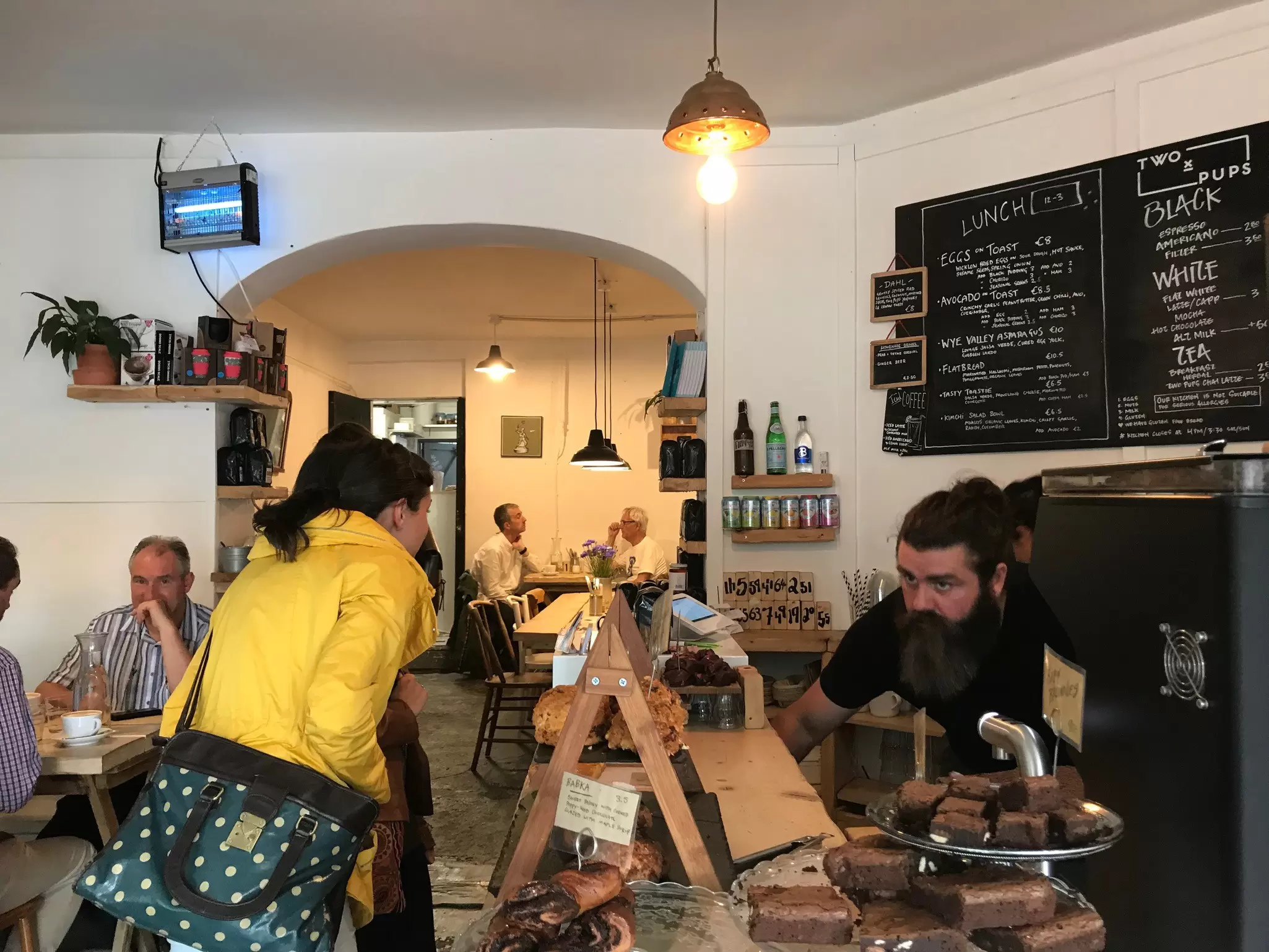 The bustling counter at Two Pups Coffee. 