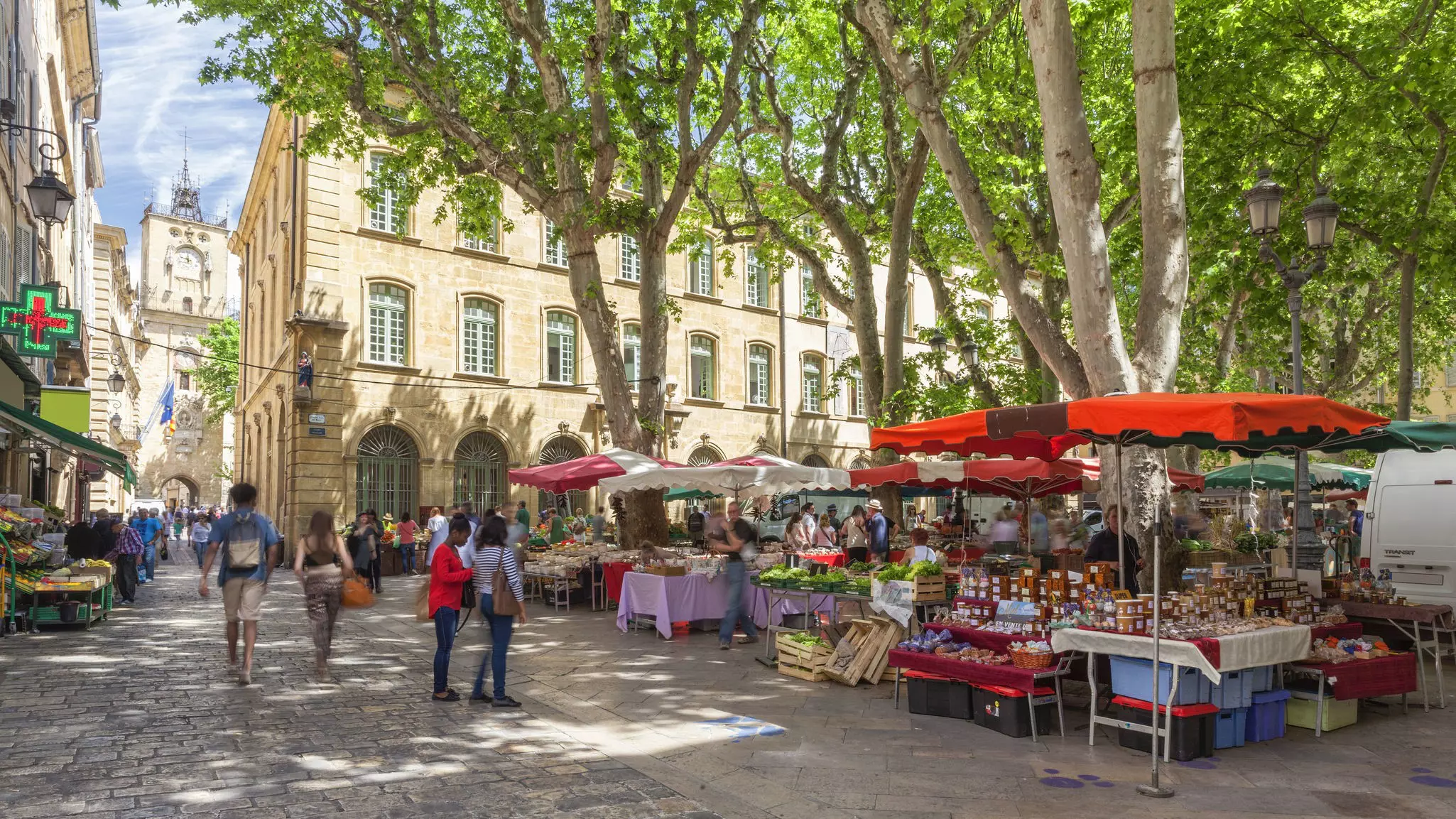 Market on a square in Aix en Provence, France.