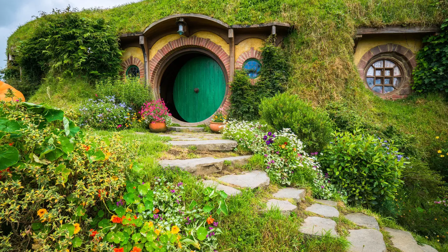 Hobbit holes and hobbit gardens in Hobbiton Movie Set, New Zealand.