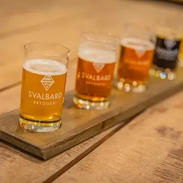 LONGYEARBYEN, SVALBARD, ARCTIC CIRCLE - NORWAY - NOVEMBER 17, 2021: Svalbard also known as Spitsbergen, or Spitzbergen, is a Norwegian archipelago in the Arctic Ocean. op Svalbard brewery; Shutterstock ID 2120536493; your: Kristen Parker; gl: 6505...