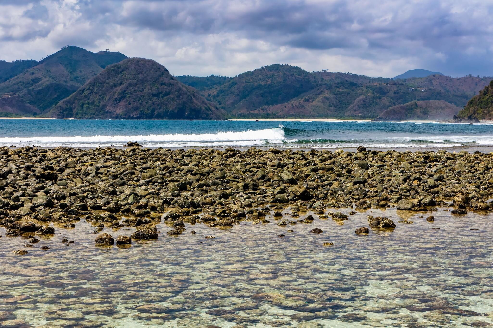 2XA50EH Rocky, tropical beach surrounded by blue ocean (Semeti Beach, Lombok)
2XA50EH
Lombok, Pantai, Semeti, Semeti, beach, ocean, indonesia, secluded, paradise, tropical, vacation, asia, beach, holiday, beautiful, coastline, coral, reef, deserted, empty, exotic, holiday, idyllic, island, mawi, nature, quiet, reef, relax, relaxation, rocky, sand, sandy, sea, seascape, seashore, semeti, hills, shore, summer, sun, sunny, tourism, tranquil, tranquility, travel, tropical, beach, tropical, island
**RIGHTS MANAGED** uploaded for use on the LP app Rocky, tropical beach surrounded by blue ocean (Semeti Beach, Lombok)