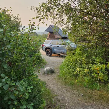 Guide to car camping: photos of the author's overlanding vehicles at various campsites throughout the United States.