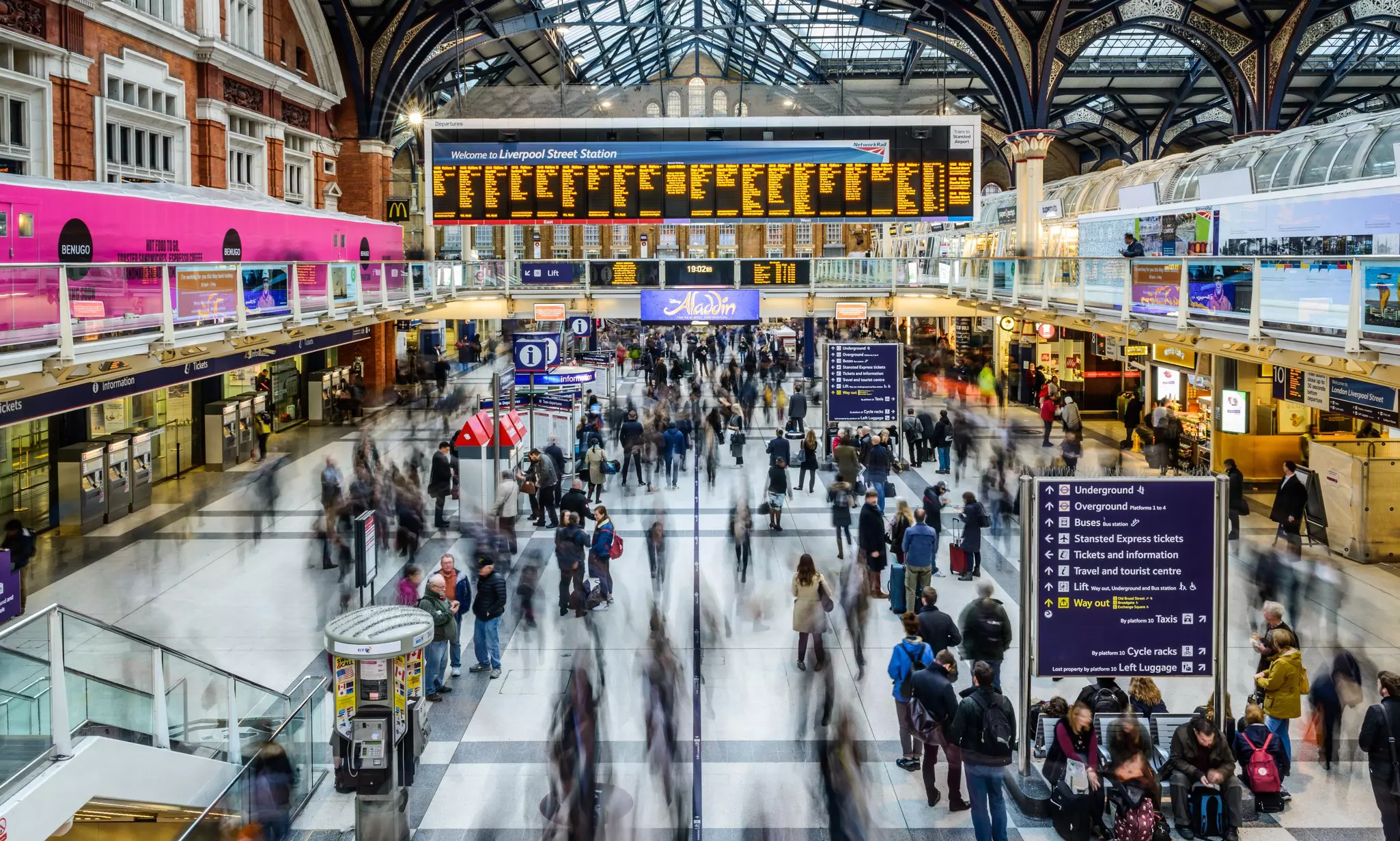 LONDON, UNITED KINGDOM - APRIL 7, 2016: People at Liverpool Street station. Opened in 1874 it is third busiest and one of the main railway stations in UK, with connection to London Underground.
