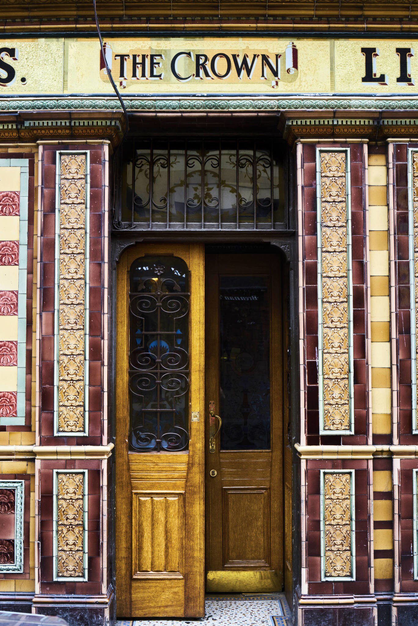 Detail of the facade of the Crown liquor saloon in Belfast, Ireland.