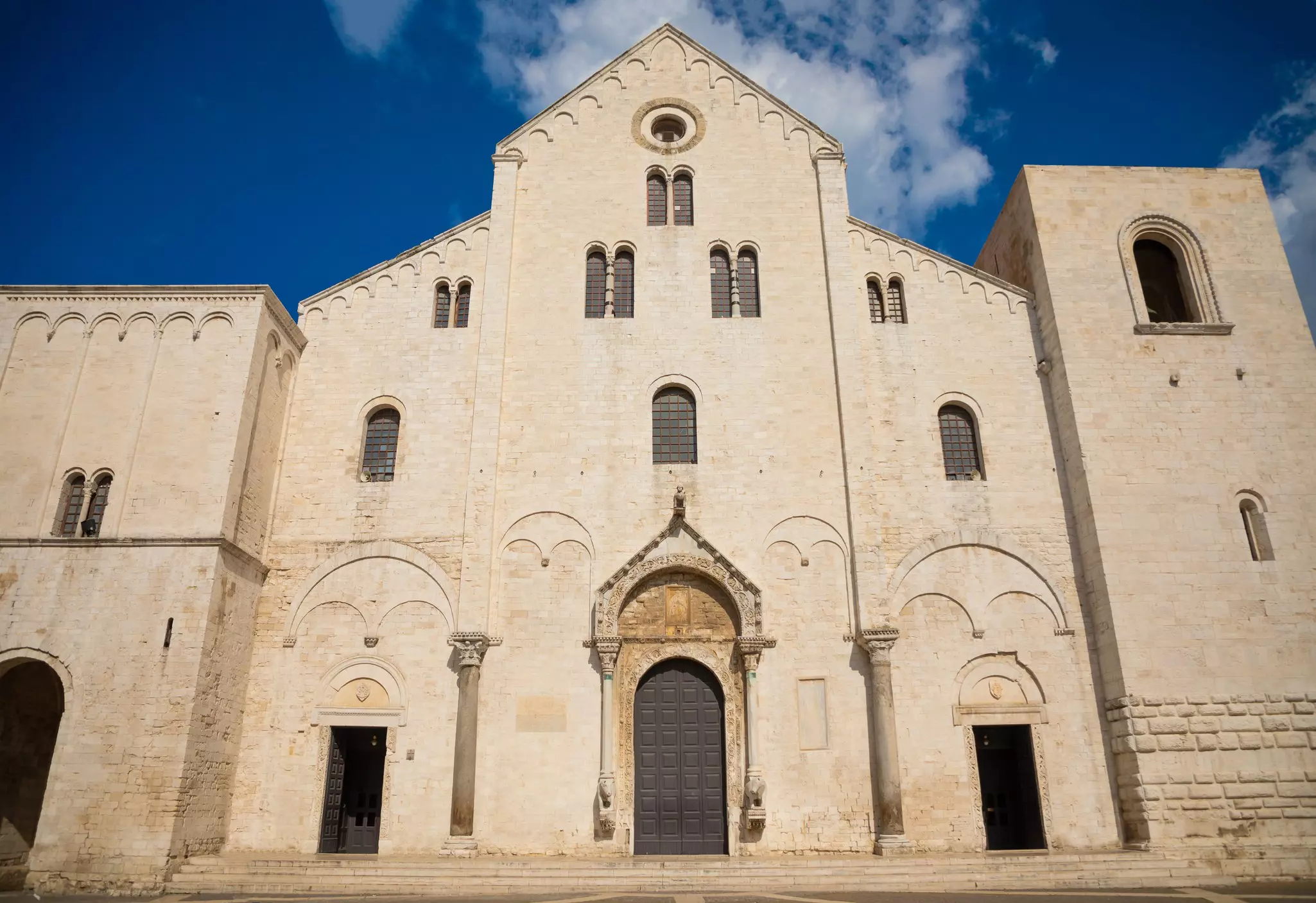 The Romanesque frontage of the Basilica di San Nicola in Bari, Puglia, Italy.