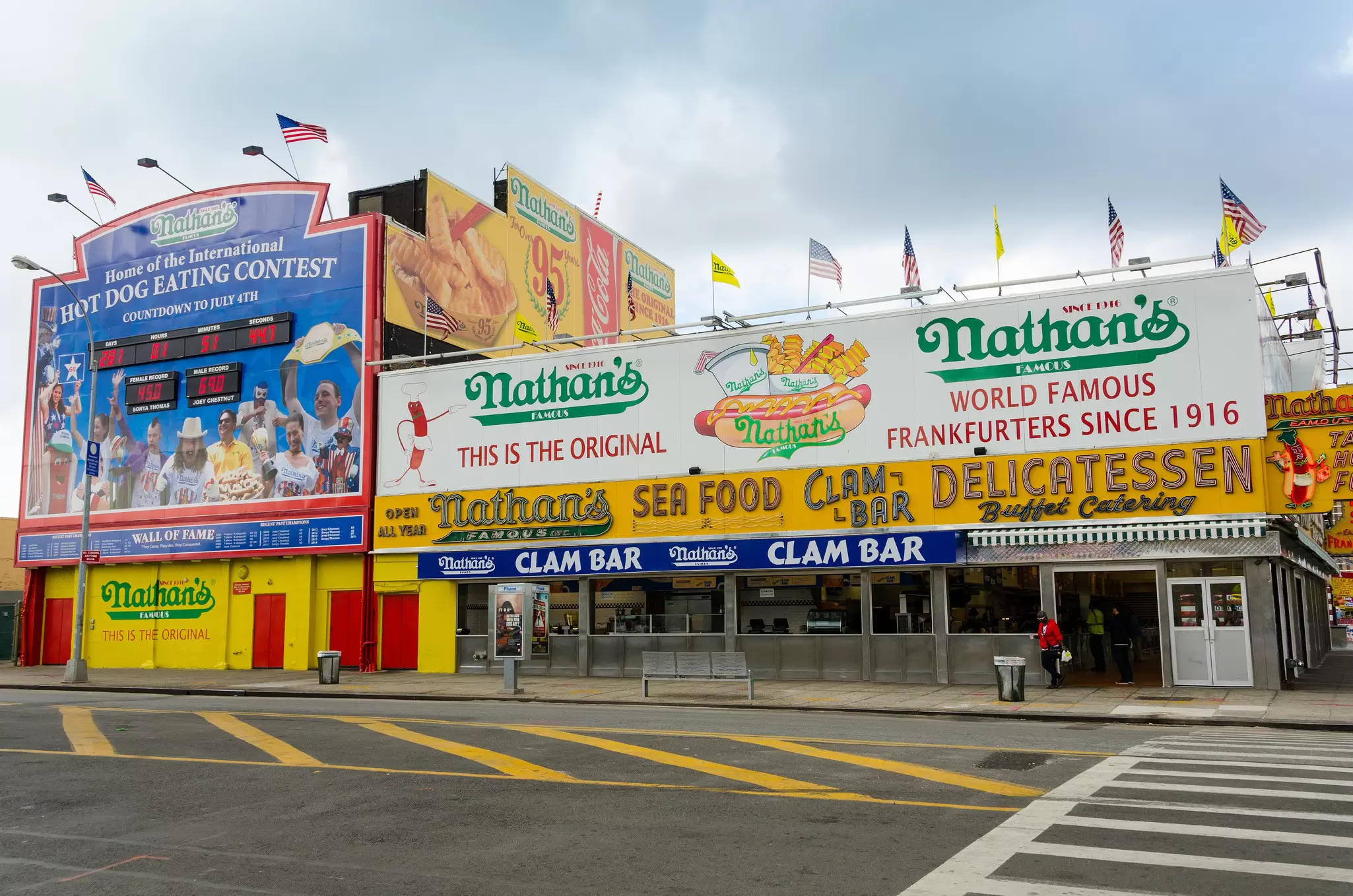 Nathan's hot dog contest countdown clock and Nathan's Famous restaurant at the corner of Surf and Stillwell avenues, Coney Island.