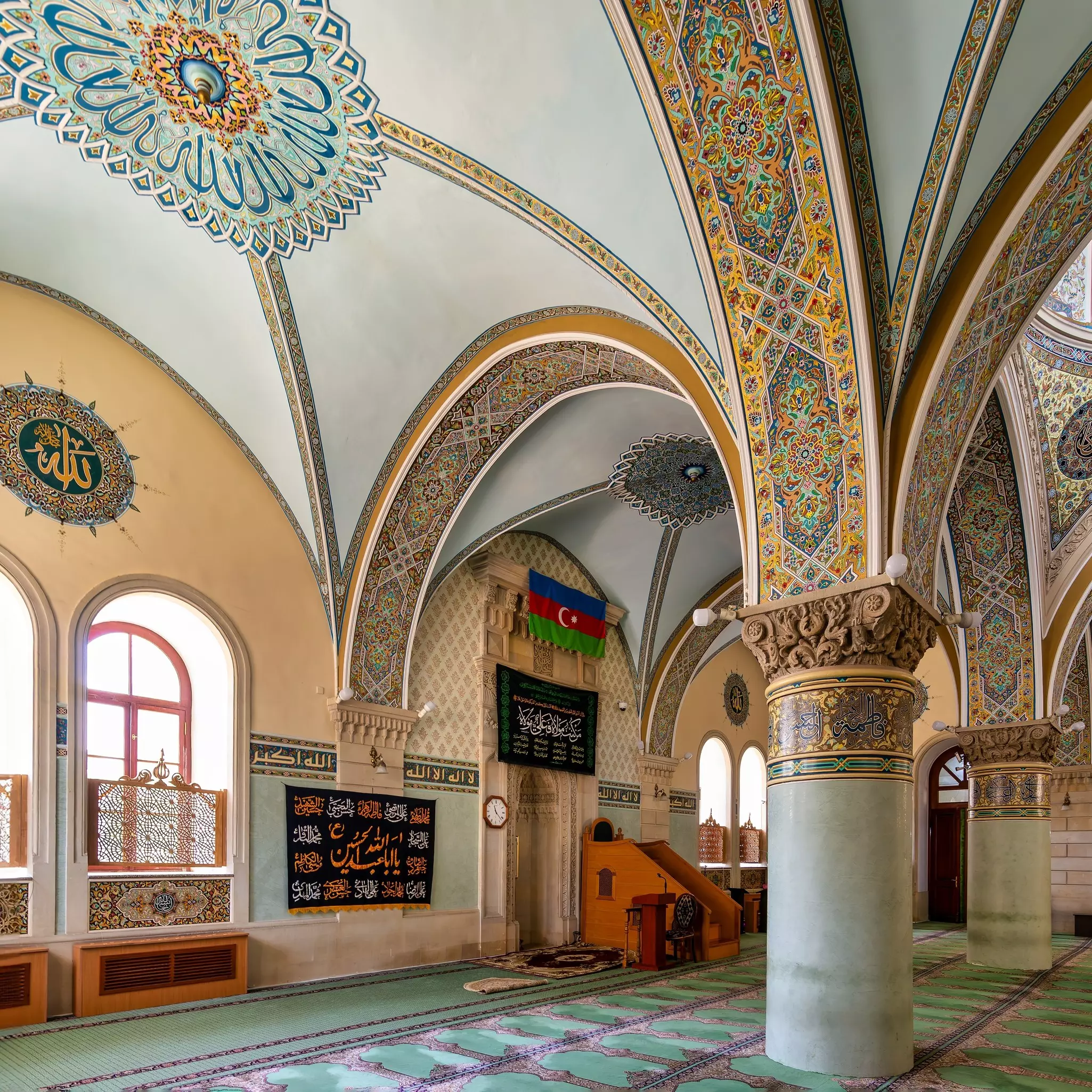 The interior of Icherisheher Juma Mosque in the Old, is adorned with intricate details, including magnificent arches and vibrant artistic motifs
