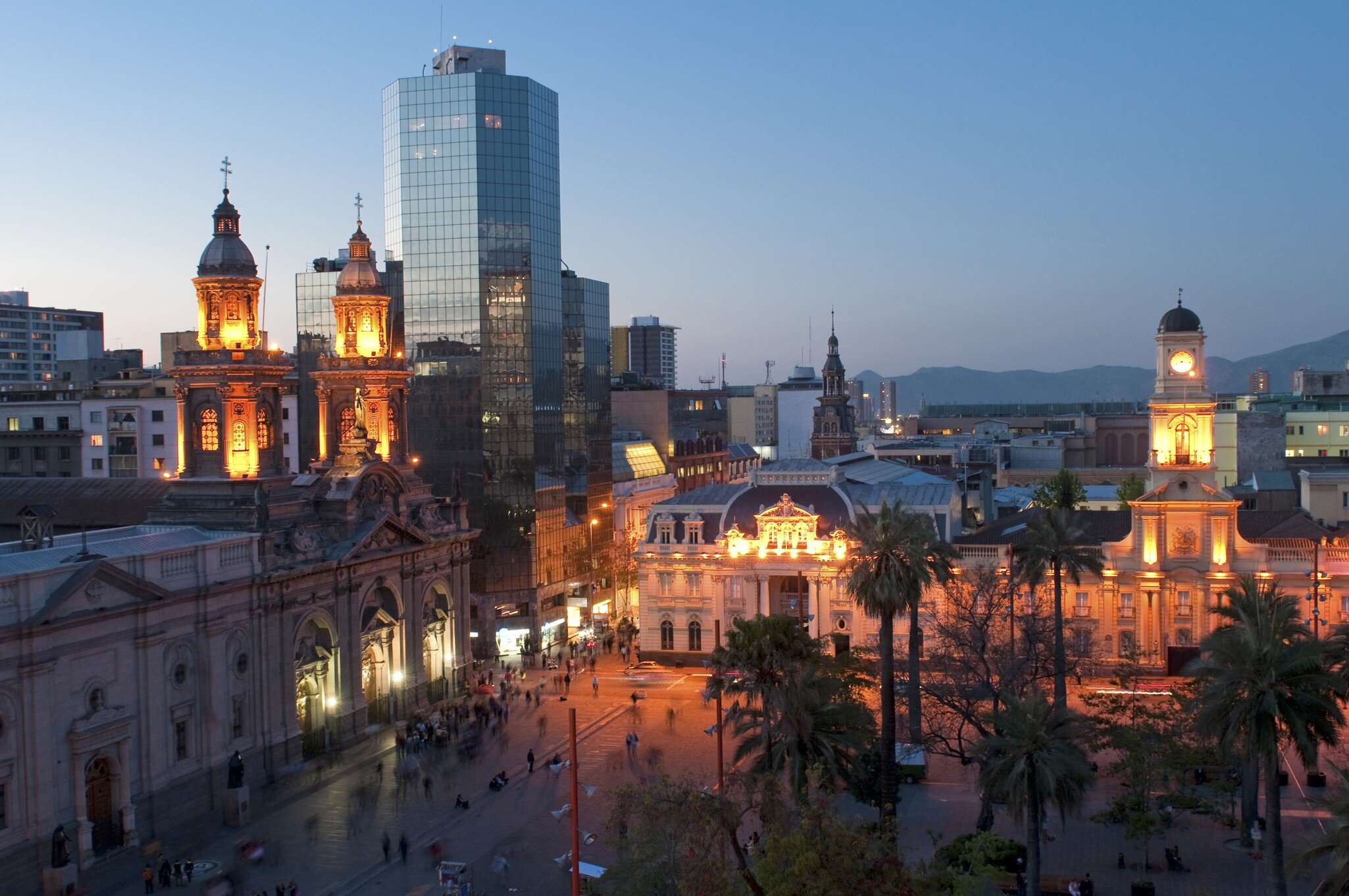 Plaza De Armas, Santiago Chile at dusk
Architecture; Building Exterior; Built Structure; Capital Cities; Chile; Chilean Culture; City; City Life; Cityscape; Dusk; Horizontal; Nightlife; No People; Outdoors; Photography; Plaza de Armas; Plaza de Armas - Santiago de Chile; Santiago; Santiago - Chile; South America; Town Square;