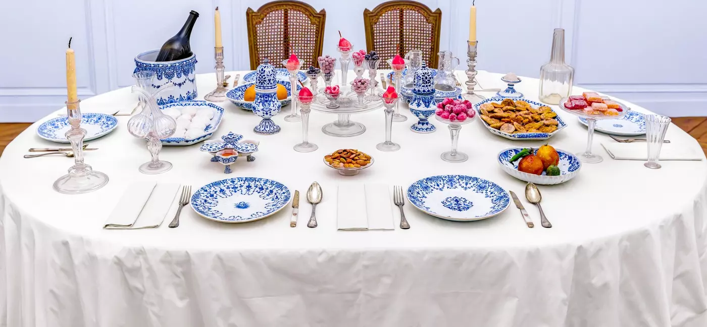 Reconstitution of a dining room with ceramic plates at a ceramics museum