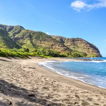 Beautiful view of Halawa Beach Park and the Halawa Valley on the remote island of Molokai (Moloka'i), Hawaii, USA.Two beaches, Kamaalaea and Kawili, are located in the bay. Popular tourist attraction.