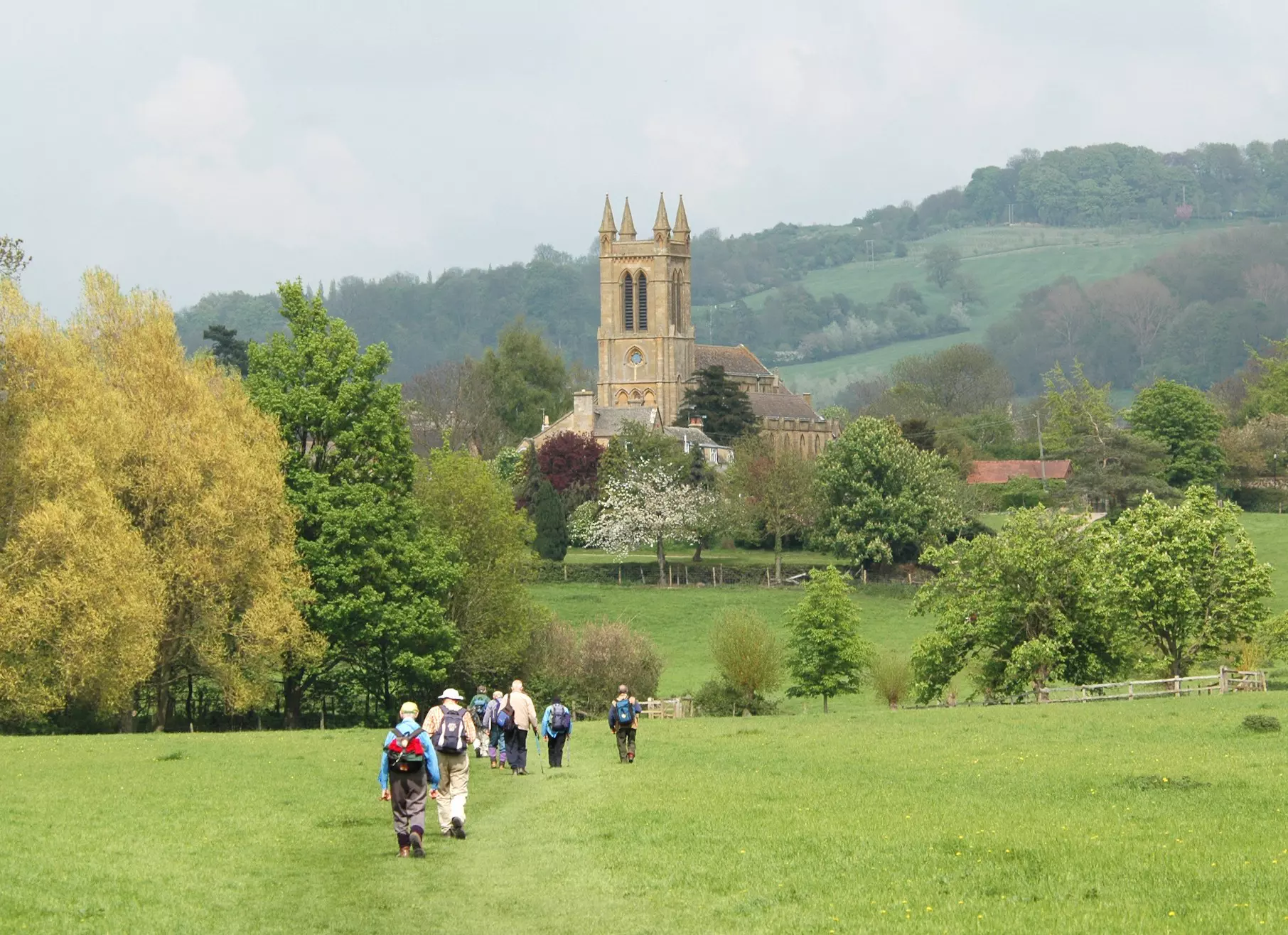 A group of older walkers on the Cotswold Way near Broadway, Cotswolds, England, United Kingdom