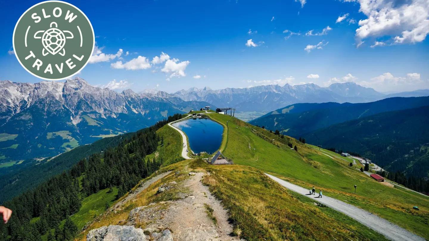 The mountain air, wildflowers and grazing cows of the Austrian Alps are only a train ride away from the city © iStock / Getty Images Plus