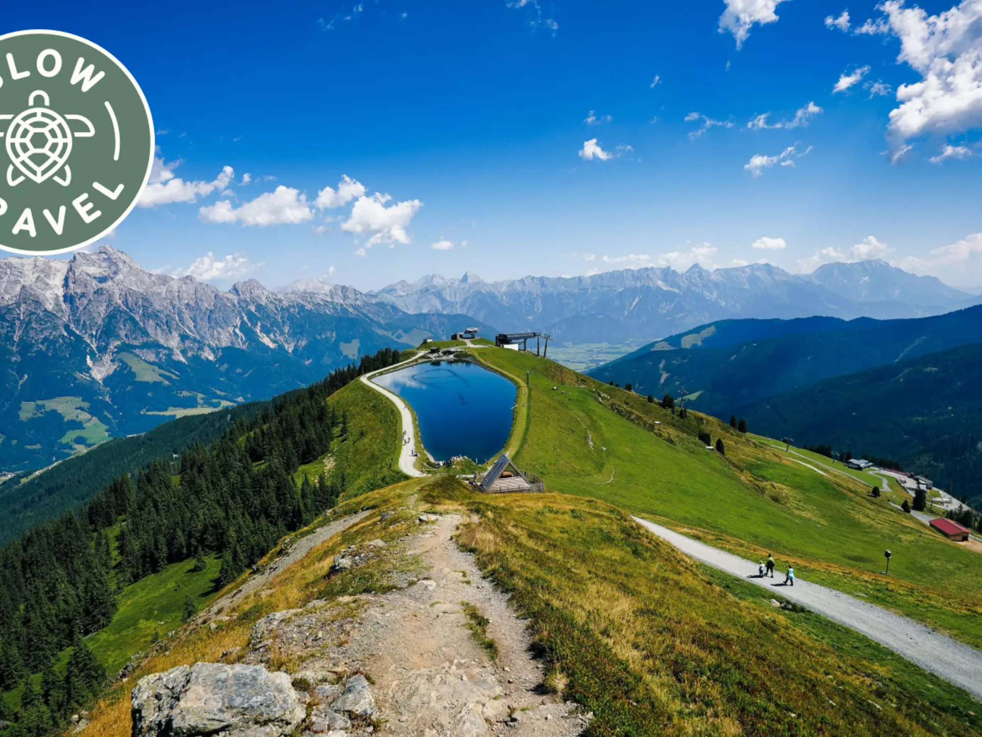 The mountain air, wildflowers and grazing cows of the Austrian Alps are only a train ride away from the city © iStock / Getty Images Plus